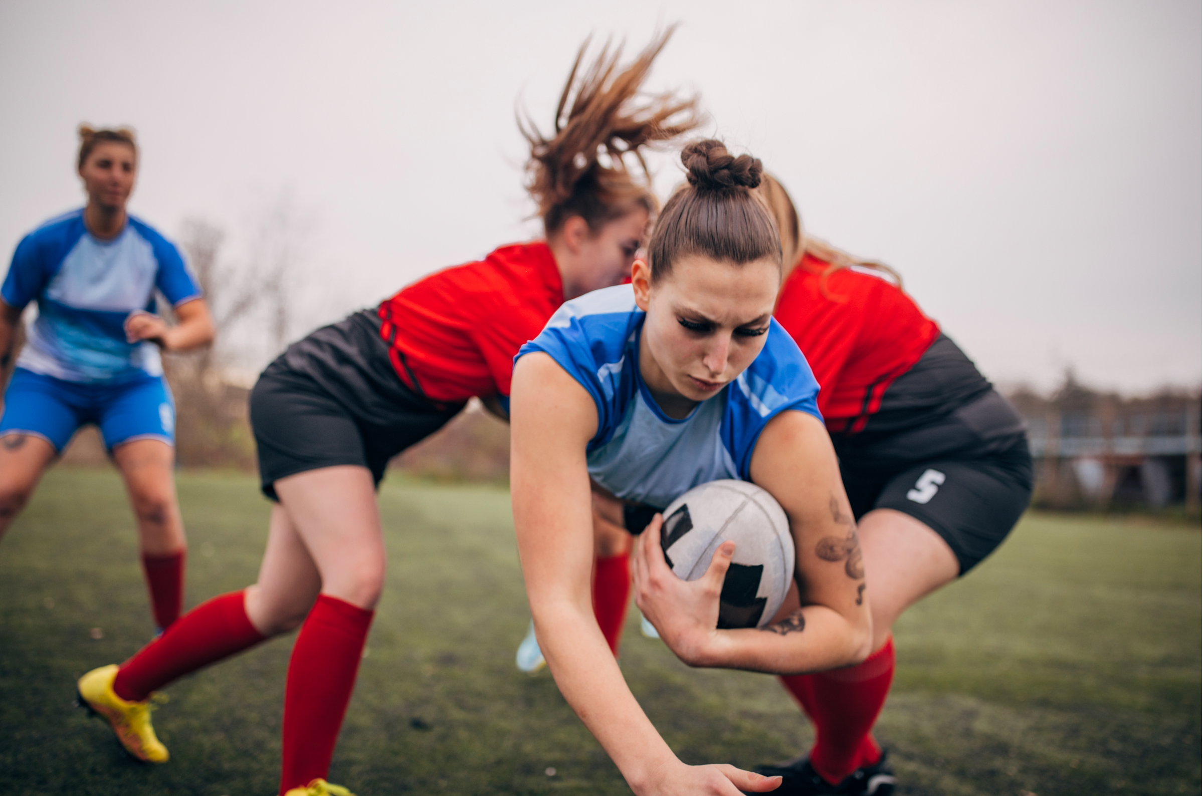 Women rugby action photo.