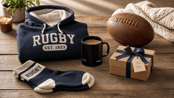 Flat lay of thoughtful rugby themed gift bundle ideas for women arranged neatly on wooden table