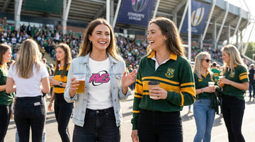 Women rugby supporters comparing casual fanwear and match jerseys outside the stadium before kickoff