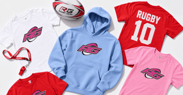 Flat lay of durable kids rugby gear featuring youth women's rugby tees and hoodie by Rugby Girl