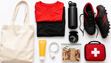 Essential rugby tournament packing list gear including women's jerseys and boots laid out flat for players