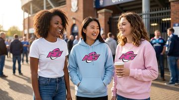 Women rugby supporters in graphic RG Impact tees hoodies building team spirit outfits