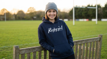 Woman in oversized navy Signature rugby hoodie by pitch bench fit explained