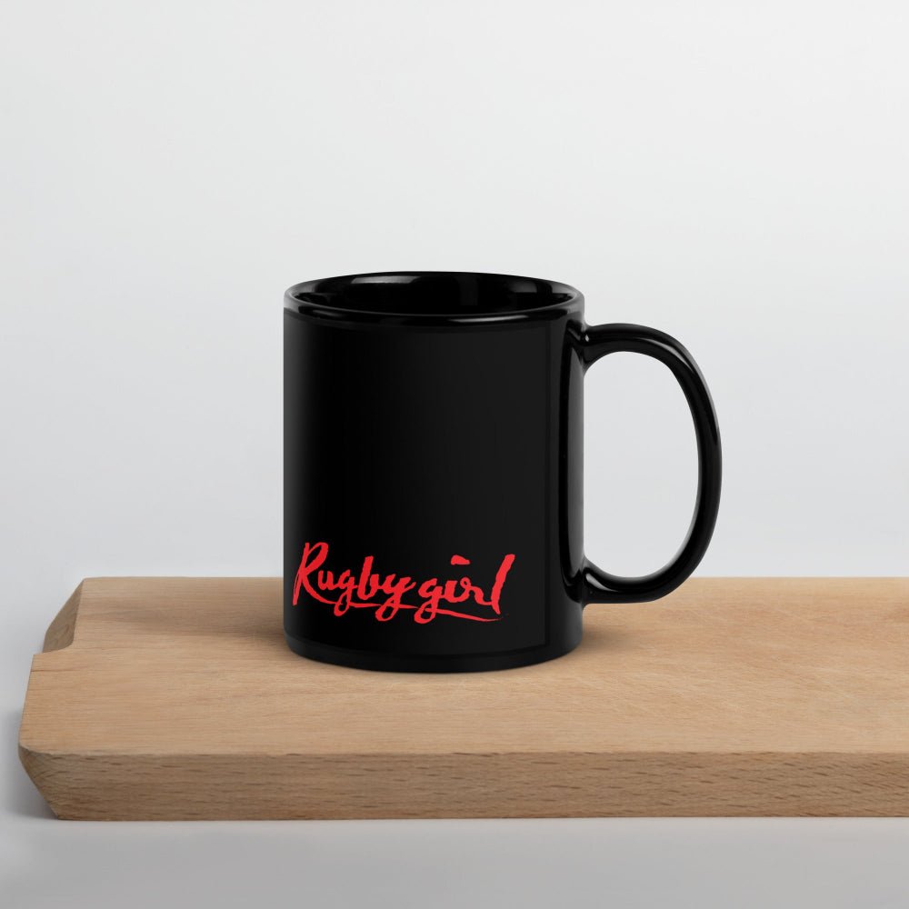 Black ceramic mug with bold red "Rugby girl" script, perfect rugby gift for women fans. - Rugby Girl