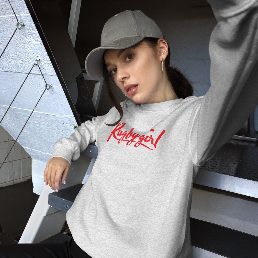 Light gray women's rugby sweatshirt with bold red "Rugby girl" script, casual sportswear style. - Rugby Girl