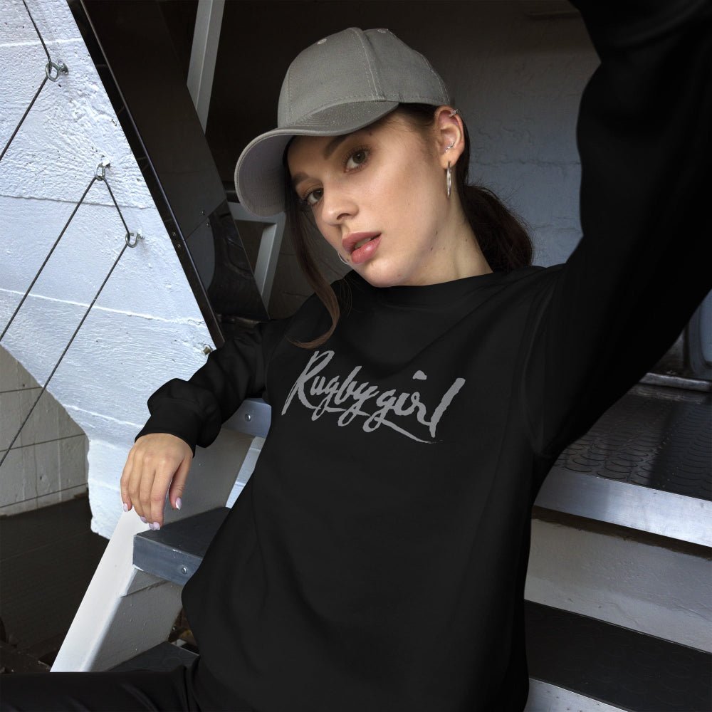 Black women's rugby sweatshirt with "Rugby girl" script logo, casual sporty style and relaxed fit. - Rugby Girl