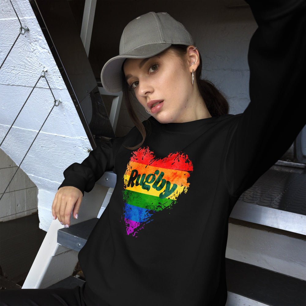 Black women's sweatshirt with bold rainbow "Rugby" heart graphic, perfect rugby gift or rugby girl apparel. - Rugby Girl