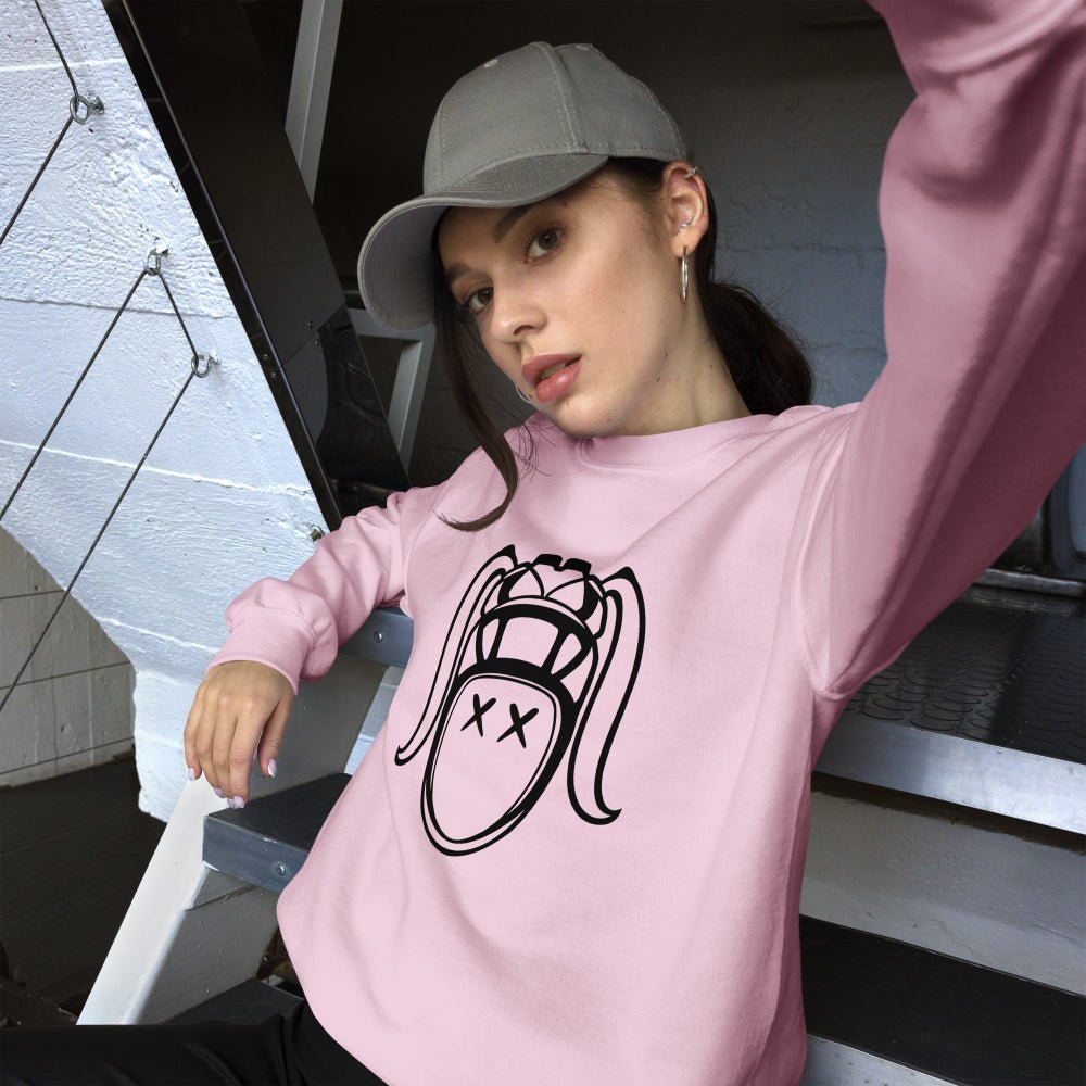 Light pink women's rugby sweatshirt with bold black harlequin face design, casual rugby apparel. - Rugby Girl