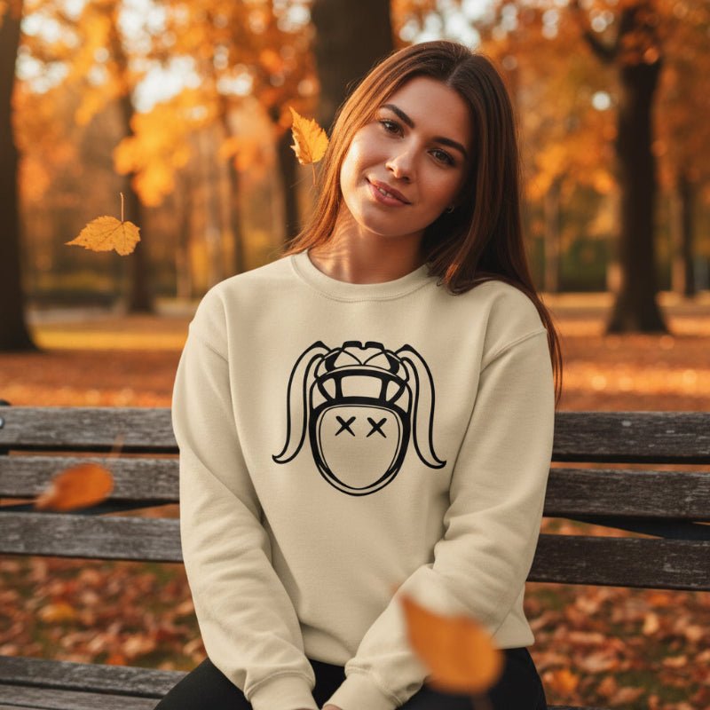 Sand-colored women's rugby sweatshirt with bold black harlequin rugby girl graphic, casual rugby apparel for leisure and fans. - Rugby Girl