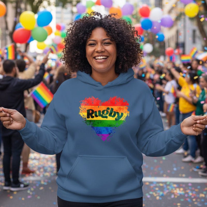 Indigo blue women's rugby hoodie with rainbow pride heart and rugby text, casual rugby apparel. - Rugby Girl