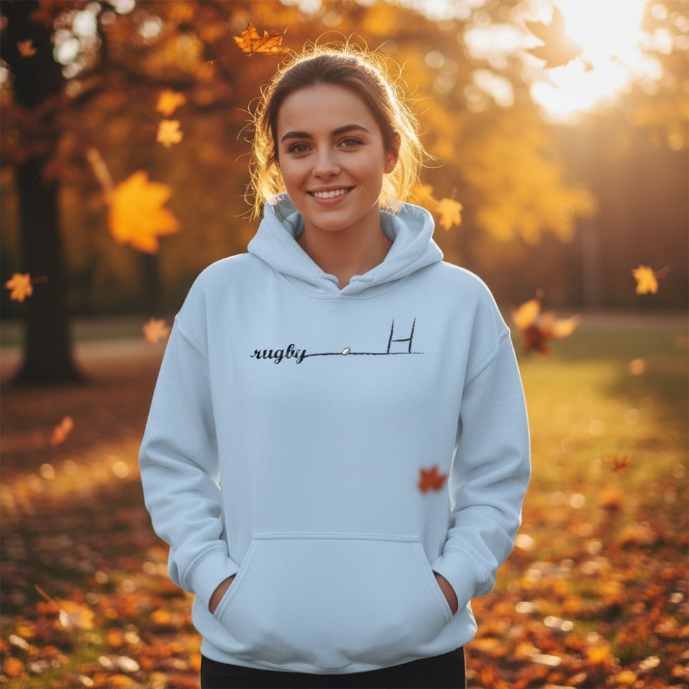 Light blue women's rugby hoodie with minimalist goalpost design, casual fit for rugby fans and players. - Rugby Girl