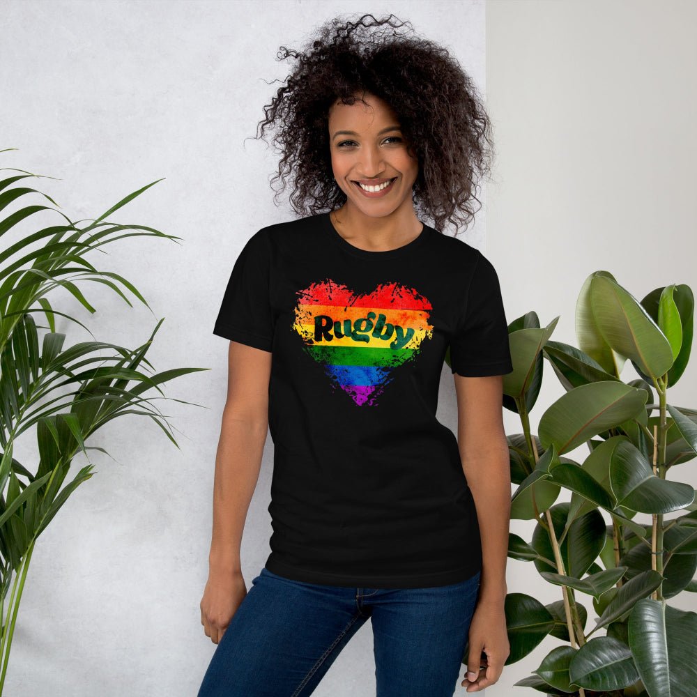 Black women's rugby t-shirt with rainbow pride paint splash and bold "Rugby" text, casual fit. - Rugby Girl