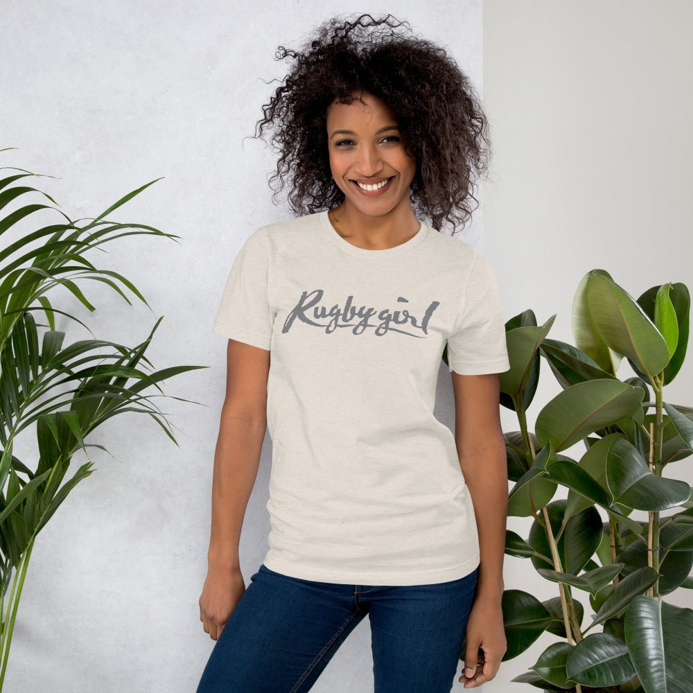 Women's rugby t-shirt in cream with bold "Rugby girl" script, casual fit for rugby fans and players. - Rugby Girl