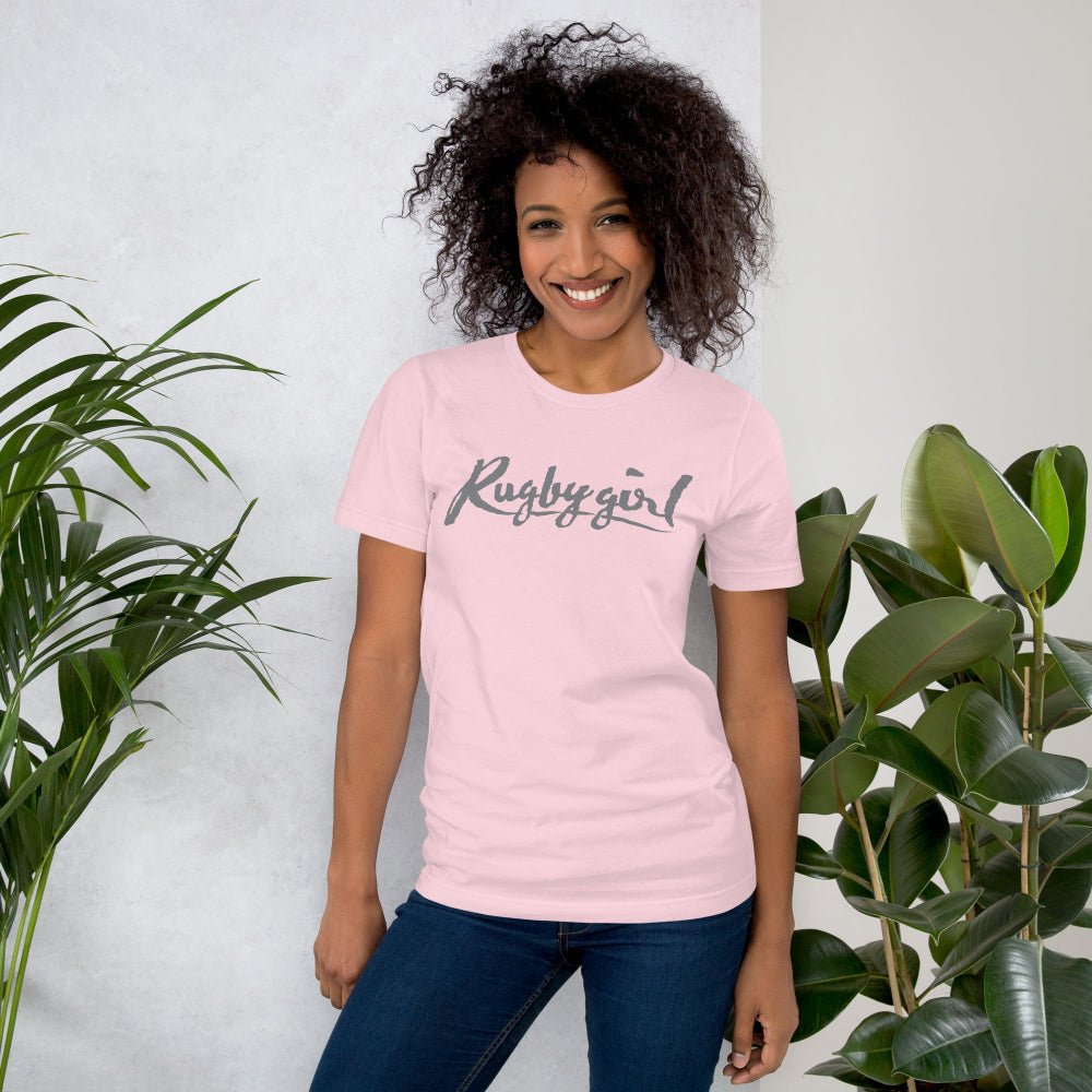 Soft pink women's rugby t-shirt with "Rugby girl" script, casual fit for rugby fans. - Rugby Girl