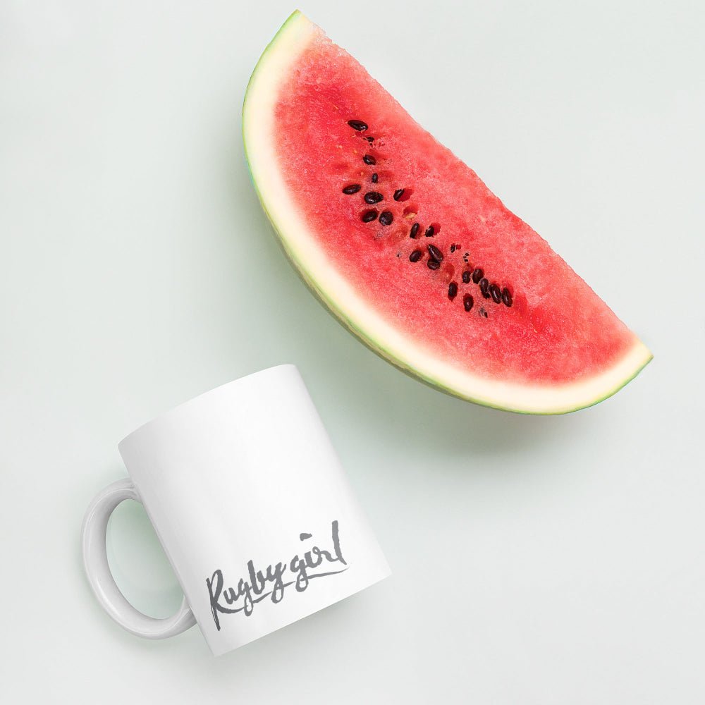 White ceramic mug with grey "Rugby girl" script, perfect rugby gift for women's rugby apparel fans. - Rugby Girl