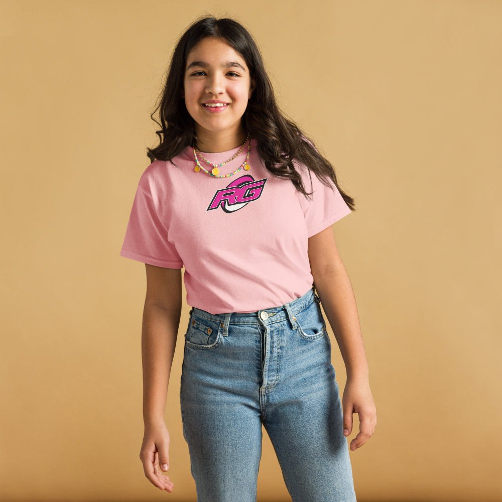 Light pink RG Impact kids rugby t-shirt with bold logo, styled for young rugby girls and fans. - Rugby Girl